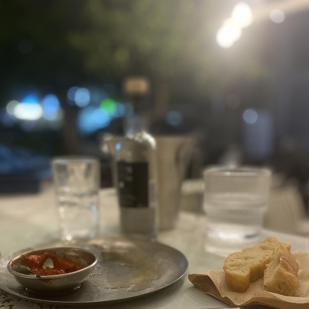 empty dishes, bottle, glasses